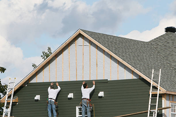 Professional Siding Contractor technician working in Milton, FL